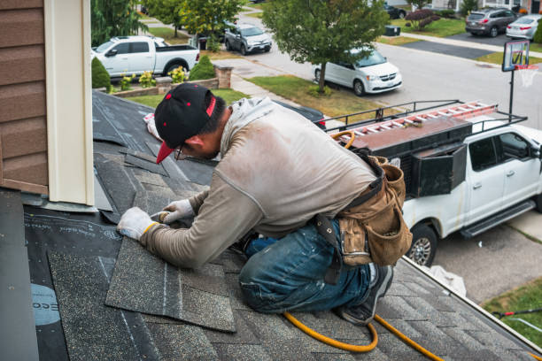 Professional Flat Roof Repair technician working in Olivet, MI